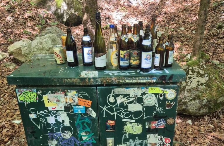 Beer bottles and graffiti on the mountain