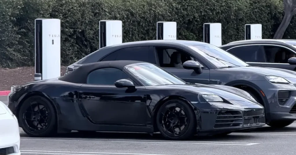 Electric-Porsche-Boxster-seen-plugged-into-Tesla-Supercharger-in-California.webp