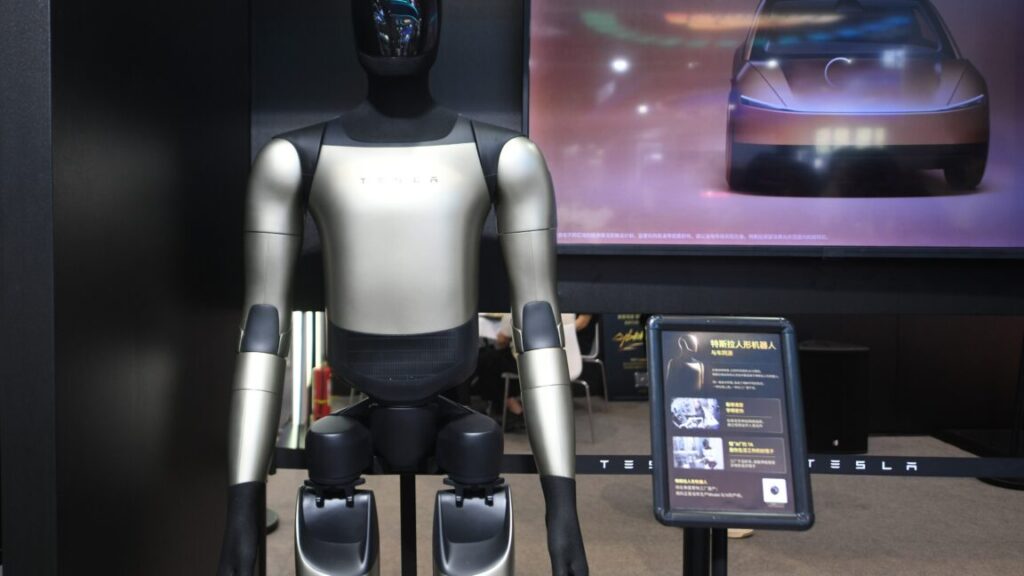 Tesla-workers-resist-training-Optimus-humanoid-robots-as-replacements.jpg