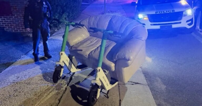 Police-arrest-two-men-traveling-on-an-electric-sofa-on.jpg